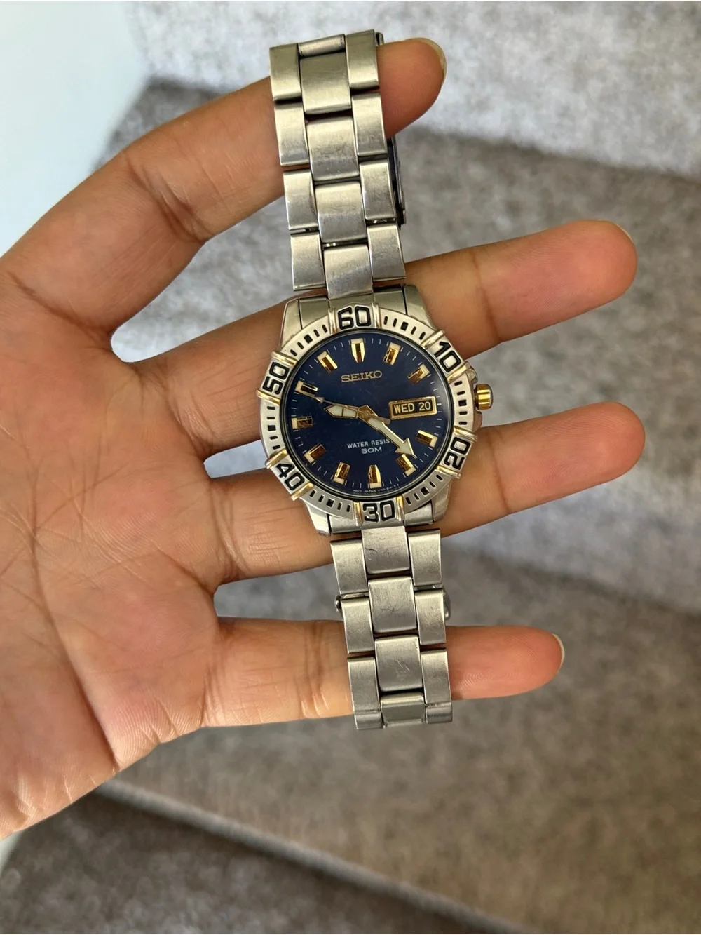 Seiko Blue Dial Stainless Steel Watch with Gold Accents Mens Watch